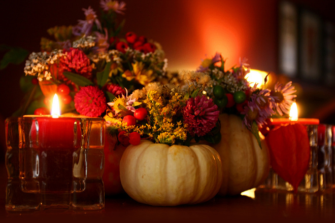 A Fall table setting with decorative pumpkins